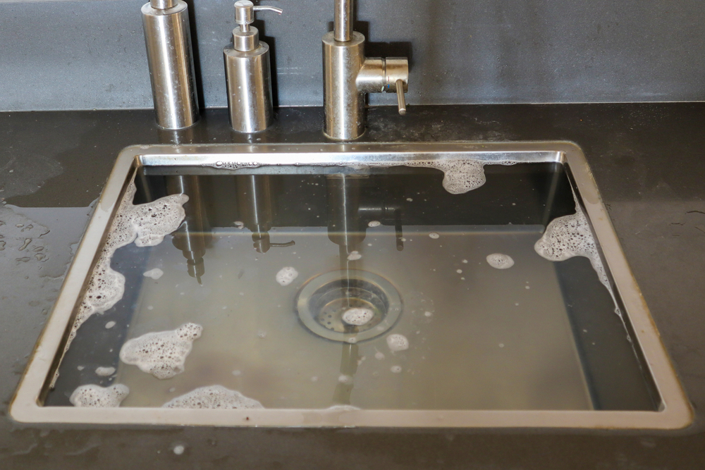 A clogged drain plaguing a home